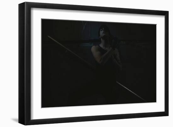 Young Man Posing in Dark Setting-Luis Beltran-Framed Photographic Print