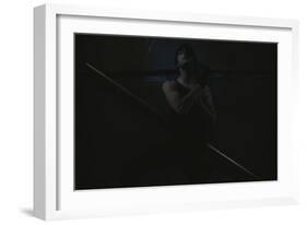 Young Man Posing in Dark Setting-Luis Beltran-Framed Photographic Print