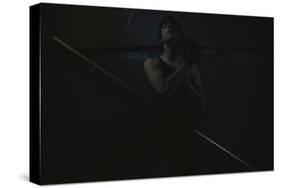 Young Man Posing in Dark Setting-Luis Beltran-Stretched Canvas