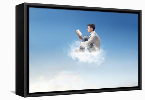 Young Man Reads Sitting On A Cloud-olly2-Framed Stretched Canvas