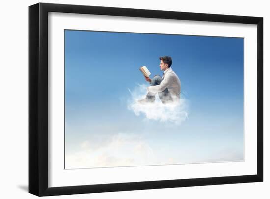 Young Man Reads Sitting On A Cloud-olly2-Framed Art Print