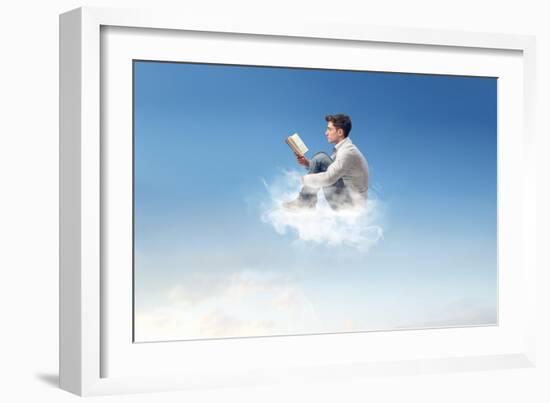 Young Man Reads Sitting On A Cloud-olly2-Framed Art Print