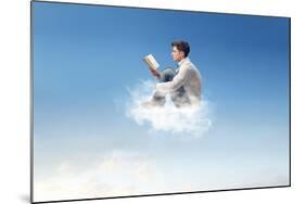 Young Man Reads Sitting On A Cloud-olly2-Mounted Art Print