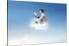 Young Man Reads Sitting On A Cloud-olly2-Stretched Canvas