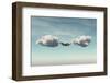 Young Man Relaxes in a Hammock between Two Clouds.-Orla-Framed Photographic Print