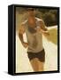 Young Man Running on the Beach-null-Framed Stretched Canvas