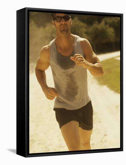 Young Man Running on the Beach-null-Framed Stretched Canvas