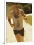 Young Man Running on the Beach-null-Framed Photographic Print