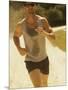 Young Man Running on the Beach-null-Mounted Photographic Print