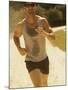 Young Man Running on the Beach-null-Mounted Photographic Print