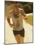 Young Man Running on the Beach-null-Mounted Photographic Print