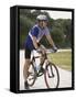 Young Man Sitting on a Bicycle-null-Framed Stretched Canvas