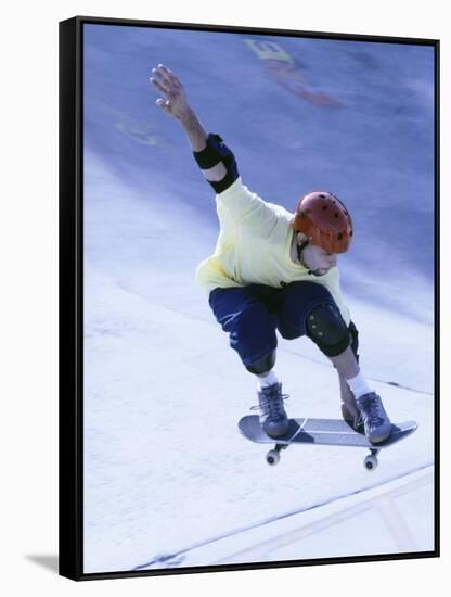 Young Man Skateboarding in Mid Air-null-Framed Stretched Canvas