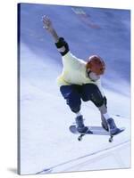 Young Man Skateboarding in Mid Air-null-Stretched Canvas