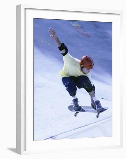 Young Man Skateboarding in Mid Air-null-Framed Photographic Print