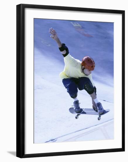 Young Man Skateboarding in Mid Air-null-Framed Photographic Print