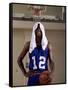 Young Man Standing Holding a Basketball with a Towel on His Head-null-Framed Stretched Canvas