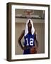 Young Man Standing Holding a Basketball with a Towel on His Head-null-Framed Photographic Print