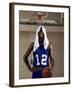 Young Man Standing Holding a Basketball with a Towel on His Head-null-Framed Photographic Print