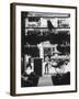 Young Man Standing in Front of a Herbs and Fish Market Displaying Racks of Fish-Howard Sochurek-Framed Photographic Print