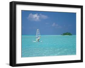 Young Man Windsurfing Near Tropical Island and Lagoon in the Maldives, Indian Ocean-Sakis Papadopoulos-Framed Photographic Print