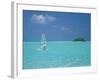 Young Man Windsurfing Near Tropical Island and Lagoon in the Maldives, Indian Ocean-Sakis Papadopoulos-Framed Photographic Print