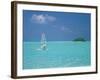 Young Man Windsurfing Near Tropical Island and Lagoon in the Maldives, Indian Ocean-Sakis Papadopoulos-Framed Photographic Print