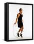 Young Man Working Out with Jump Rope-Chris Trotman-Framed Stretched Canvas