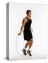 Young Man Working Out with Jump Rope-Chris Trotman-Stretched Canvas