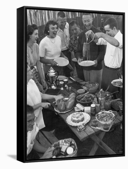Young Married Couples Enjoying a Backyard Buffet Feast , Featuring Spaghetti-Nina Leen-Framed Stretched Canvas