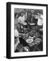 Young Married Couples Enjoying a Backyard Buffet Feast , Featuring Spaghetti-Nina Leen-Framed Premium Photographic Print