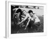 Young Men Change a Tire on an Automobile, Ca. 1918-null-Framed Photographic Print