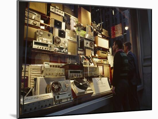 Young Men Men Look at a Window Display of Stereo and Recording Equipment, New York, NY, 1963-Yale Joel-Mounted Photographic Print