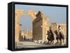Young Men on Camels, Monumental Arch, Archaelogical Ruins, Palmyra, Syria-Christian Kober-Framed Stretched Canvas