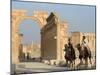 Young Men on Camels, Monumental Arch, Archaelogical Ruins, Palmyra, Syria-Christian Kober-Mounted Photographic Print