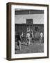 Young Men Playing Basketball with a Homemade Basket in a Farmyard-null-Framed Photographic Print