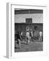 Young Men Playing Basketball with a Homemade Basket in a Farmyard-null-Framed Photographic Print