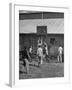 Young Men Playing Basketball with a Homemade Basket in a Farmyard-null-Framed Photographic Print