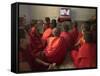 Young Monks Watch a Bollywood Movie at a Monastery-null-Framed Stretched Canvas