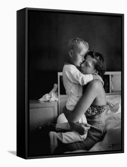 Young Mother Hugging One of Her Sons-Mark Kauffman-Framed Stretched Canvas