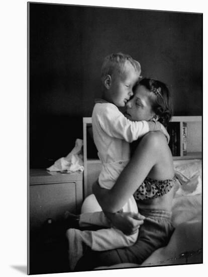 Young Mother Hugging One of Her Sons-Mark Kauffman-Mounted Photographic Print