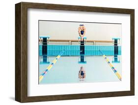 Young Muscular Swimmer Jumping from Starting Block in a Swimming Pool-NejroN Photo-Framed Photographic Print