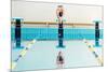 Young Muscular Swimmer Jumping from Starting Block in a Swimming Pool-NejroN Photo-Mounted Photographic Print
