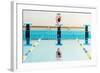 Young Muscular Swimmer Jumping from Starting Block in a Swimming Pool-NejroN Photo-Framed Photographic Print