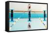 Young Muscular Swimmer Jumping from Starting Block in a Swimming Pool-NejroN Photo-Framed Stretched Canvas