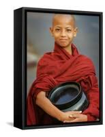 Young Myanmar Buddhist Monk Smiles Broadly as He Waits for Donations Early on a Yangon Street-null-Framed Stretched Canvas