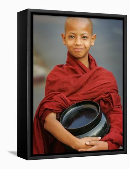 Young Myanmar Buddhist Monk Smiles Broadly as He Waits for Donations Early on a Yangon Street-null-Framed Stretched Canvas