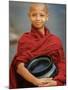 Young Myanmar Buddhist Monk Smiles Broadly as He Waits for Donations Early on a Yangon Street-null-Mounted Photographic Print