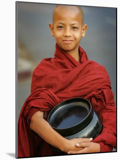 Young Myanmar Buddhist Monk Smiles Broadly as He Waits for Donations Early on a Yangon Street-null-Mounted Photographic Print