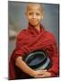 Young Myanmar Buddhist Monk Smiles Broadly as He Waits for Donations Early on a Yangon Street-null-Mounted Photographic Print